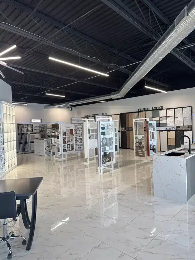 Flooring and tile sample displays across the Toledo Design House showroom near Toledo