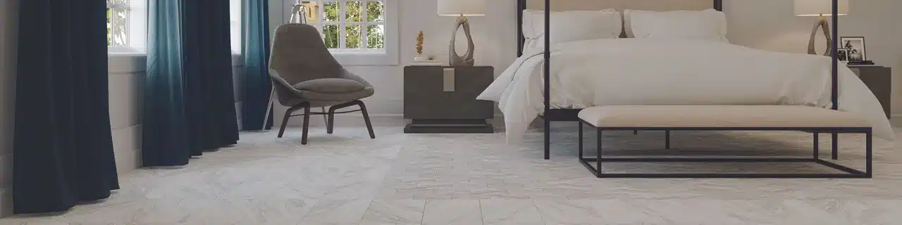 Daltile Perpetuo marble-look tile in a manufacturer bedroom scene