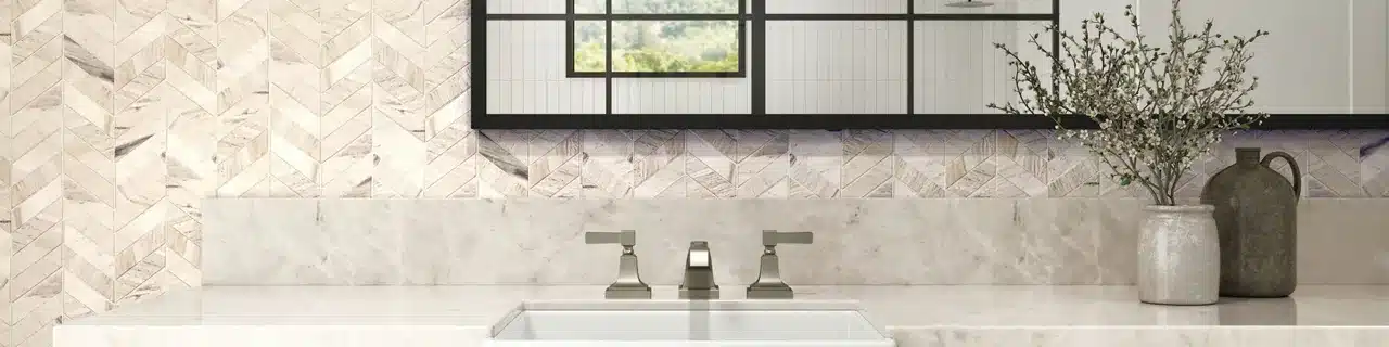 Daltile Pietra Divina marble chevron mosaic on a bathroom vanity wall in a manufacturer room scene
