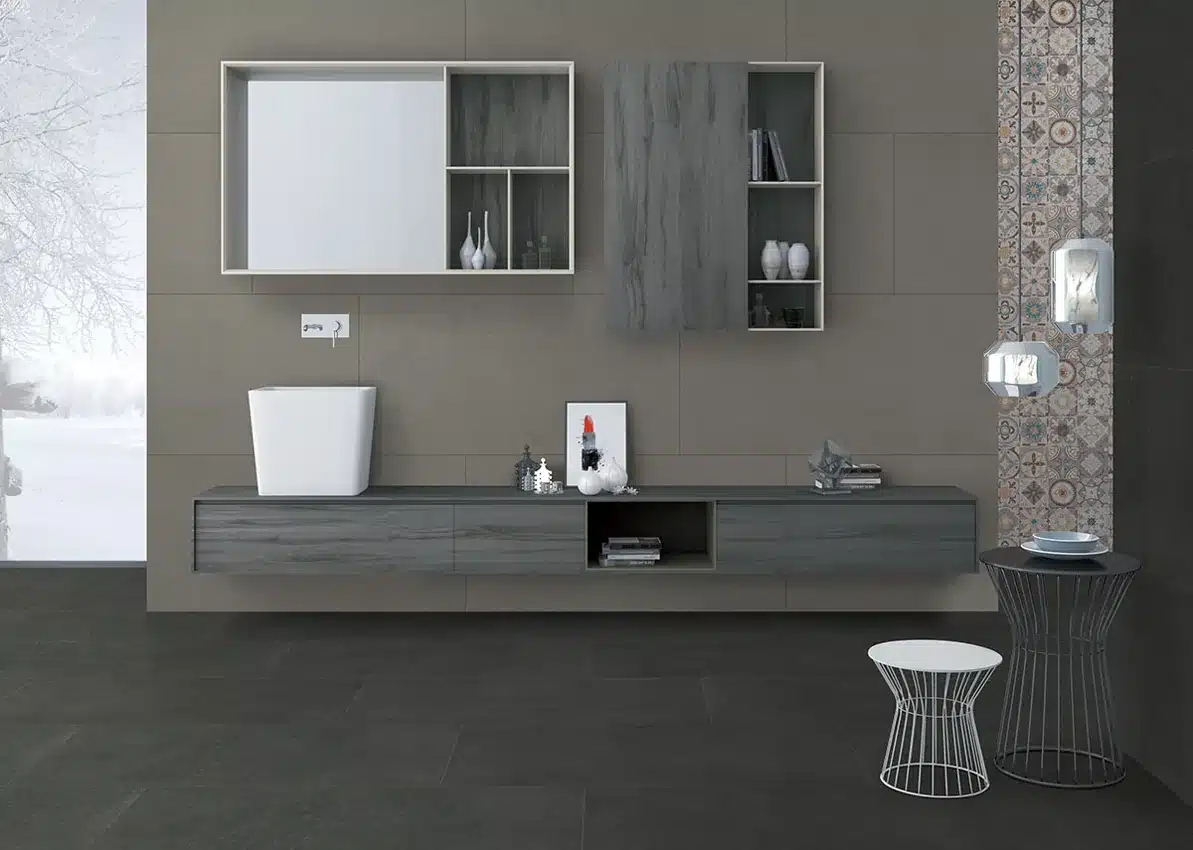 MSI Dimensions Concrete porcelain floor tile beside a bathroom vanity in a manufacturer scene