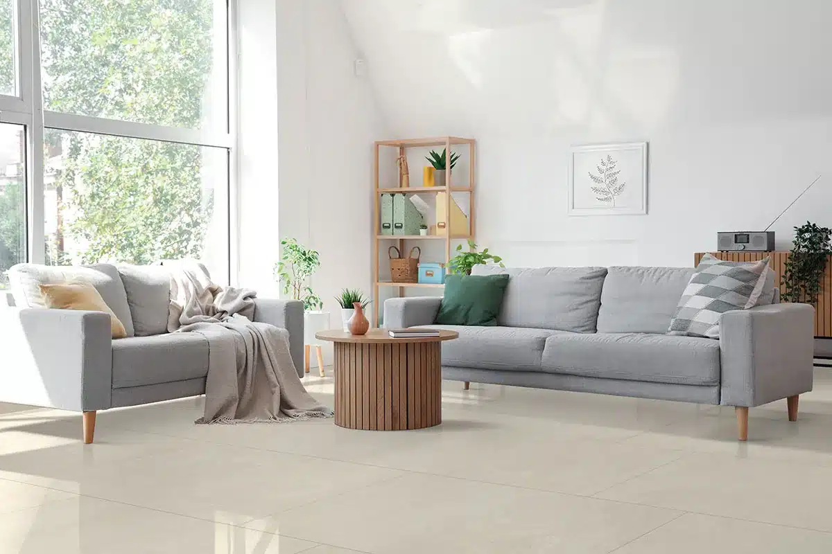 MSI Girona Marfil porcelain tile in a manufacturer living room scene