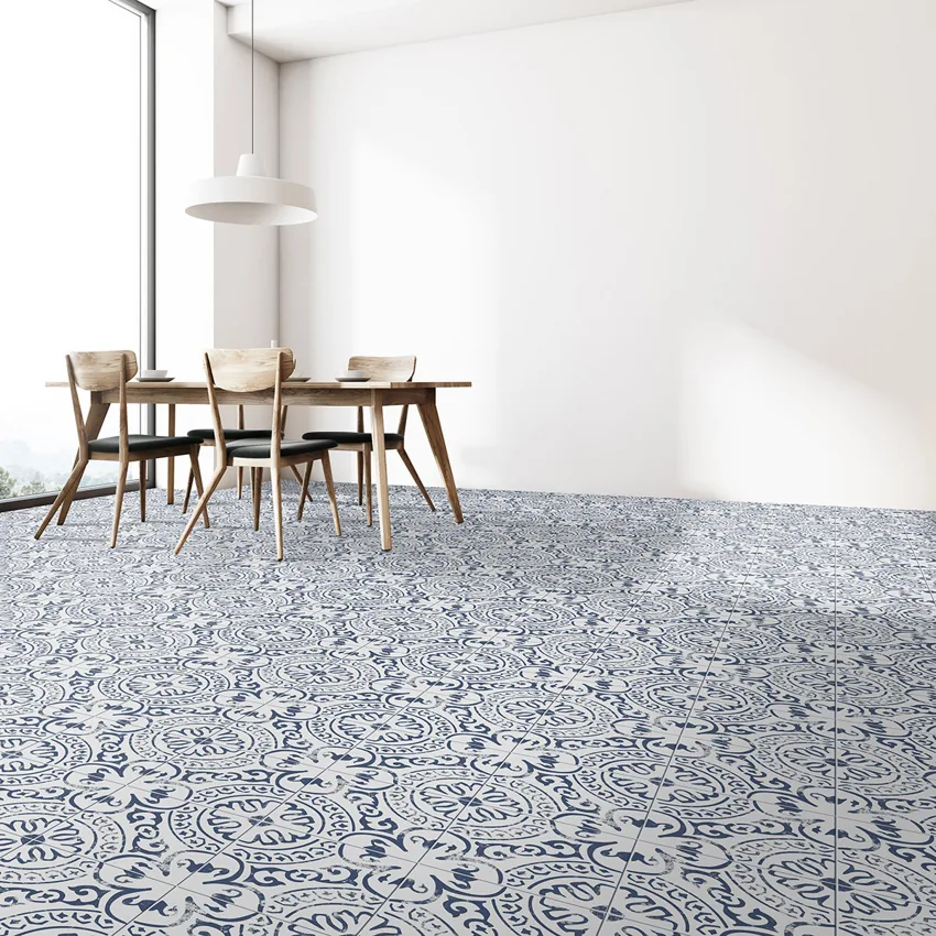 MSI Kenzzi Indigo patterned porcelain floor tile beneath a dining table in a manufacturer room scene